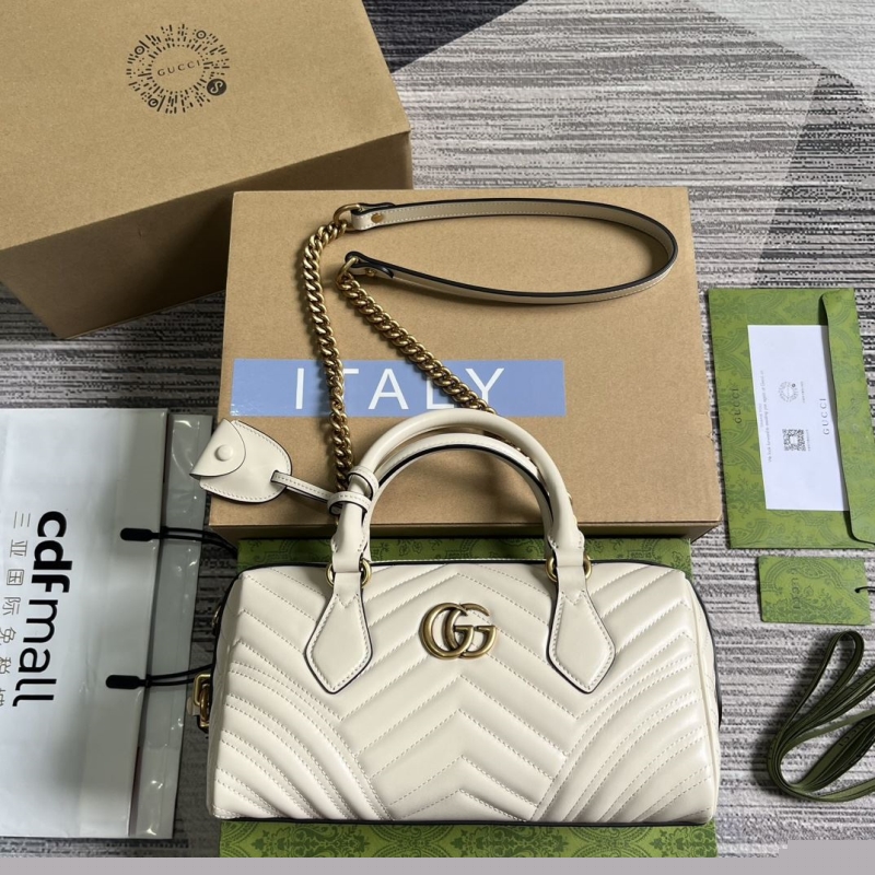 G*u*i top handle bags